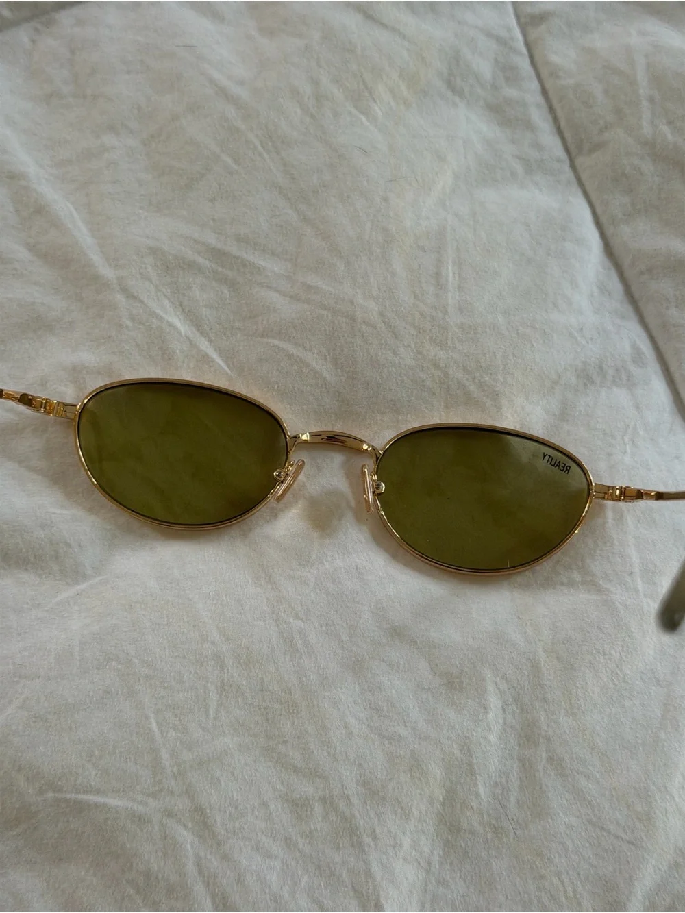 Reality eyewear Oval Gold Frame Sunglasses with Olive Green Lenses promise land